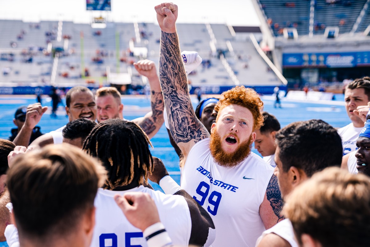 Scott Matlock with the football team on The Blue